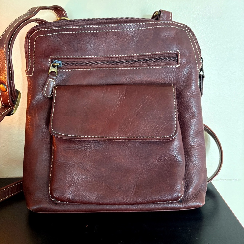 Chaos; leather cross body handbag, lined, pockets, zip close